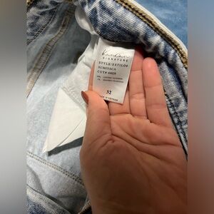 Women’s size 32 kancan jeans light colored with frey at bottom